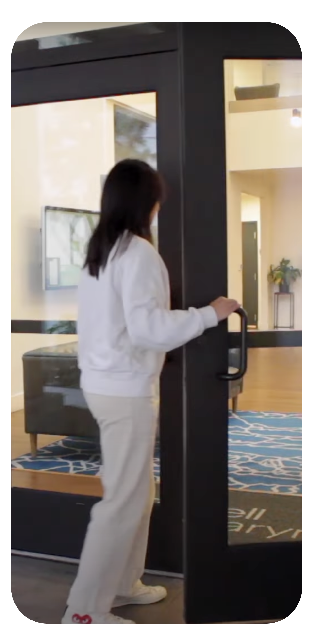 Guest being buzzed in and entering the building
